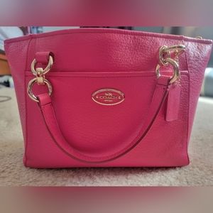 Coach hot pink satchel leather bag. Bag is 13 inches long by 8 inches high.